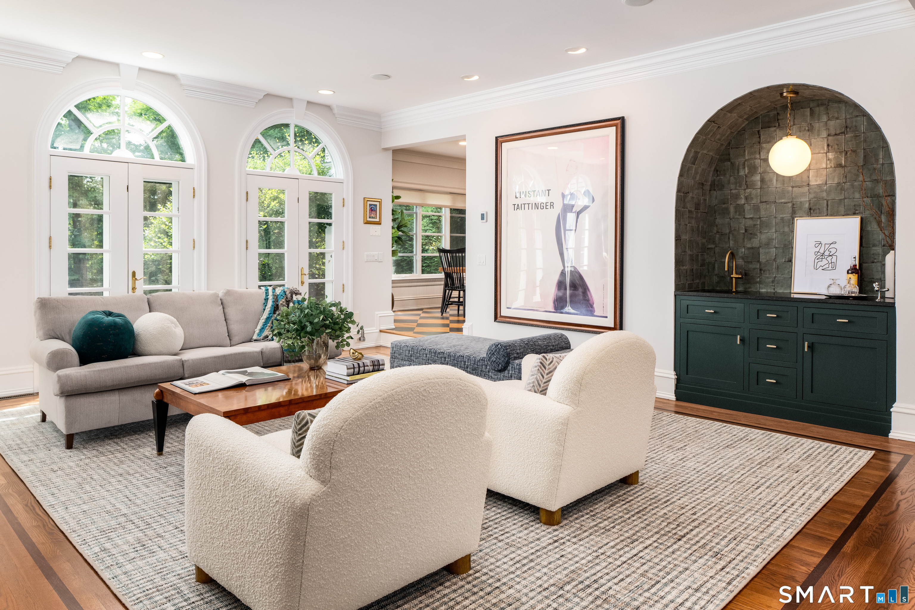 760 Smith Ridge Road New Canaan, CT 06840 - Photo 4 of 40 a living room with furniture and large windows
