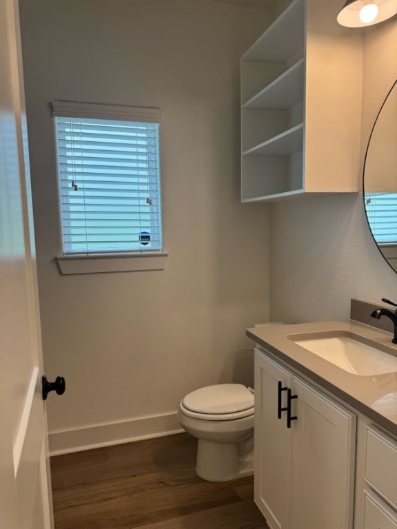 3914 Alamosa Street College Station, TX 77845 - Photo 10 of 17 a white toilet sitting next to a bathroom sink