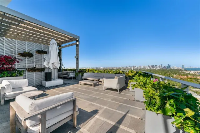 a view of a city with tall buildings