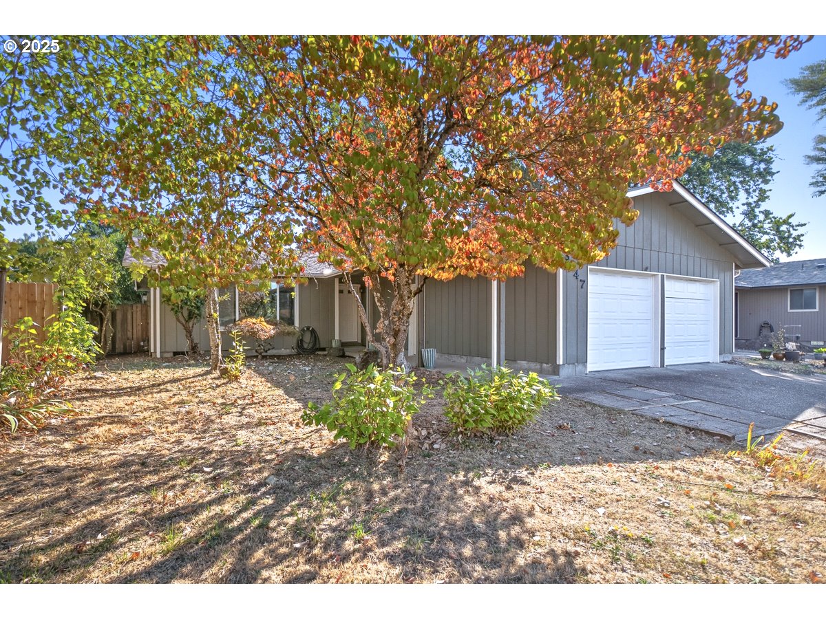 3247 Southeast Hathaway Drive Corvallis, OR 97333 - Photo 1 of 28 a backyard of a house with lots of green space