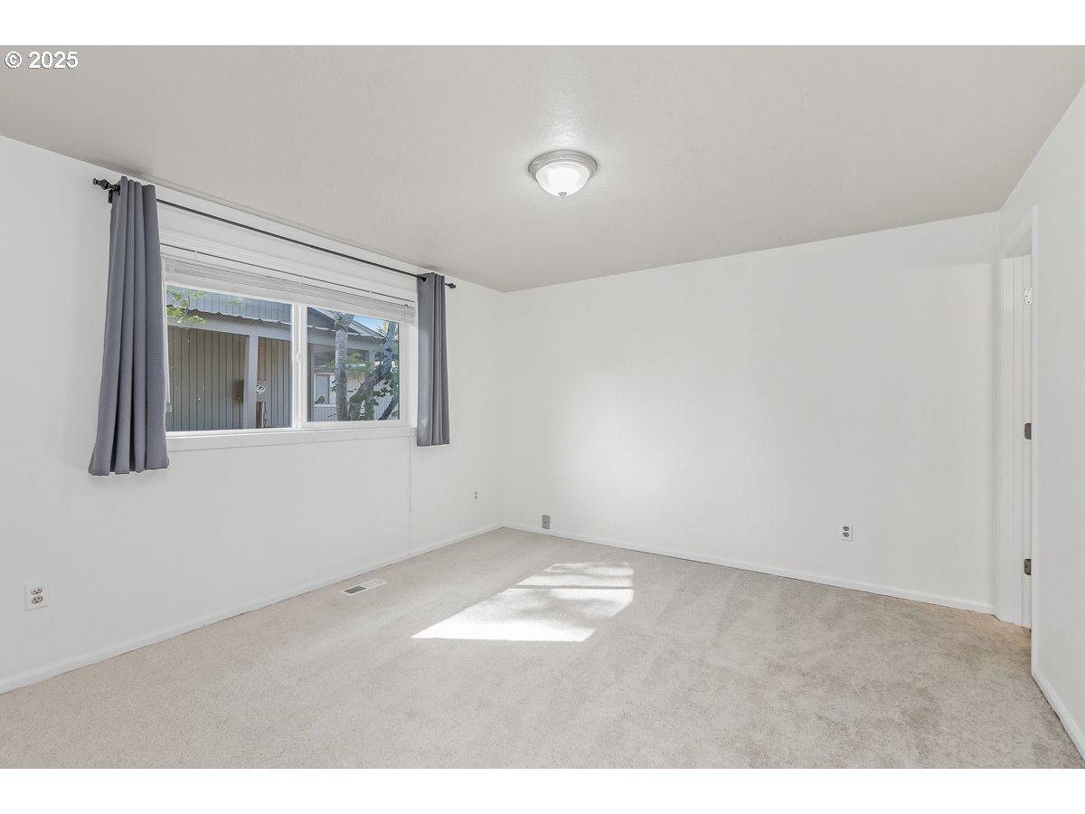 3247 Southeast Hathaway Drive Corvallis, OR 97333 - Photo 11 of 28 view of an empty room with a window
