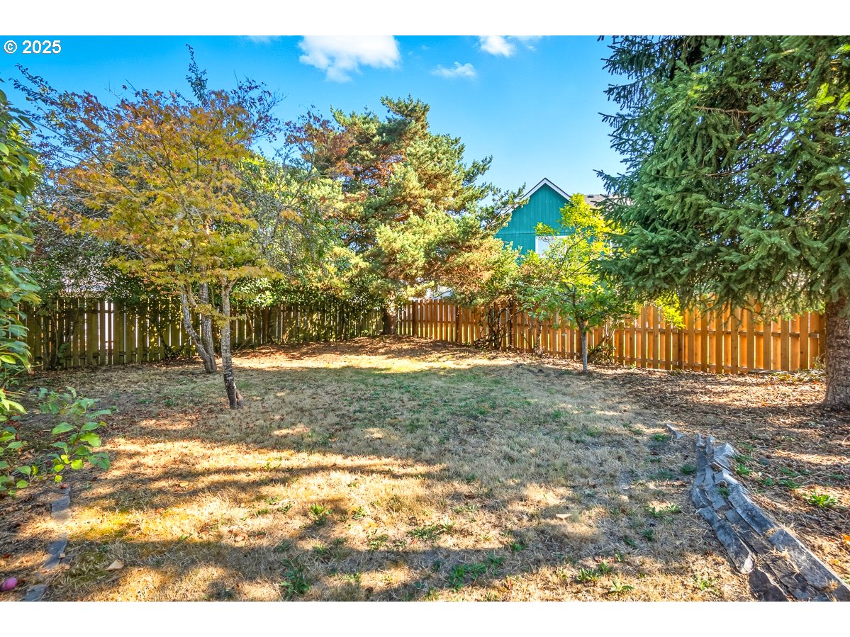 3247 Southeast Hathaway Drive Corvallis, OR 97333 - Photo 23 of 28 a view of yard with tree