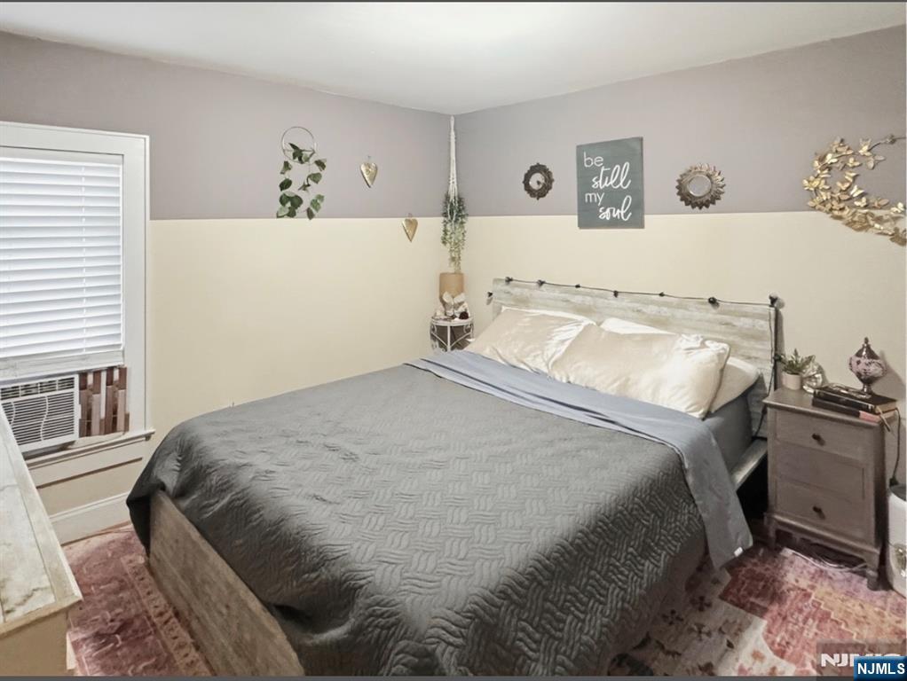 68 Washington Avenue Rutherford, NJ 07070 - Photo 14 of 23 a bedroom with a bed and a window