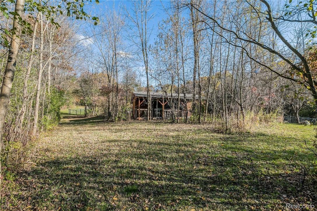 277 North Baldwin Road Oxford, MI 48371 - Photo 40 of 45 BACK OF BARN