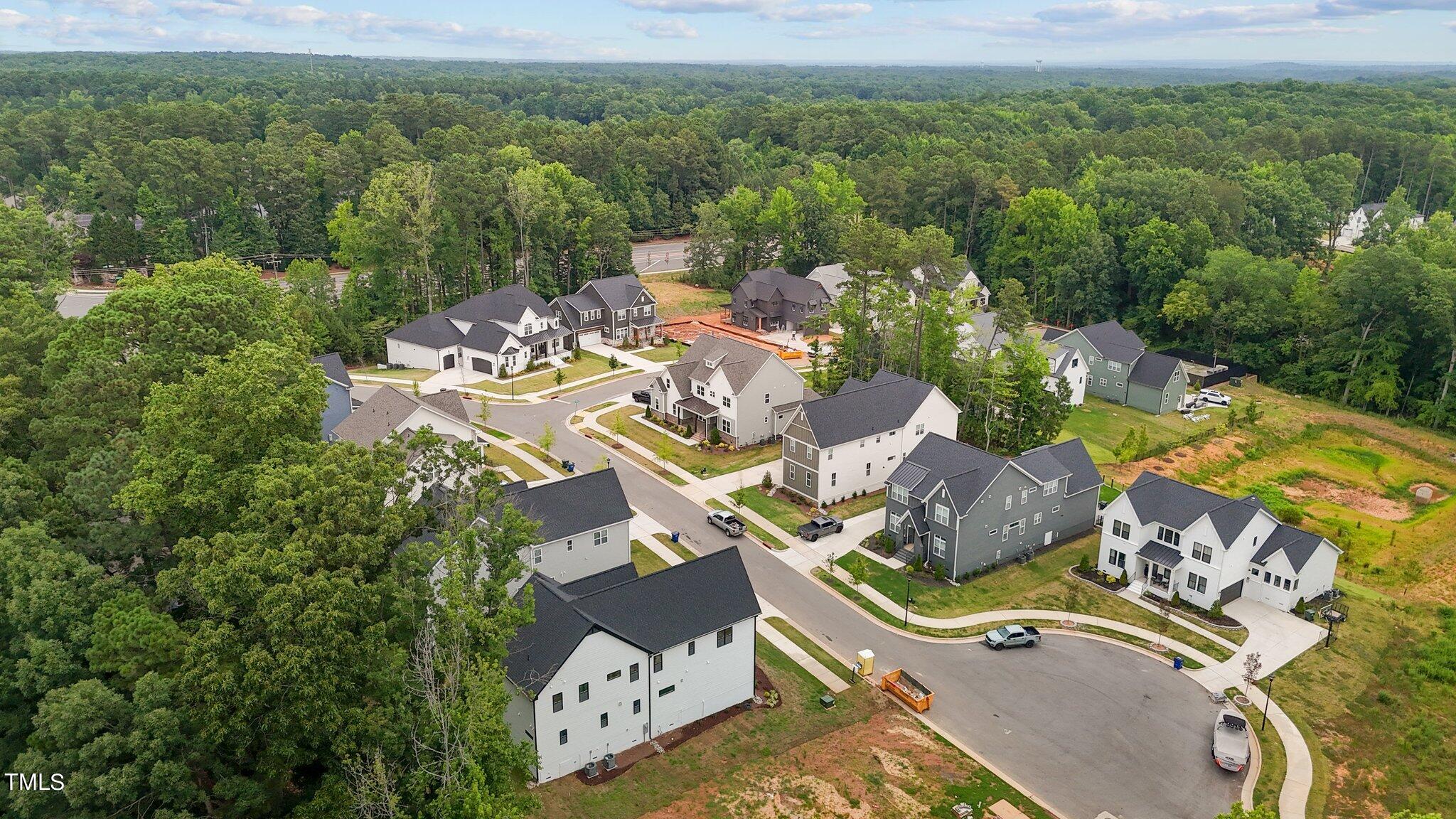 9313 Field Maple Court Raleigh, NC 27613 - Photo 3 of 53 an aerial view of a house with outdoor space
