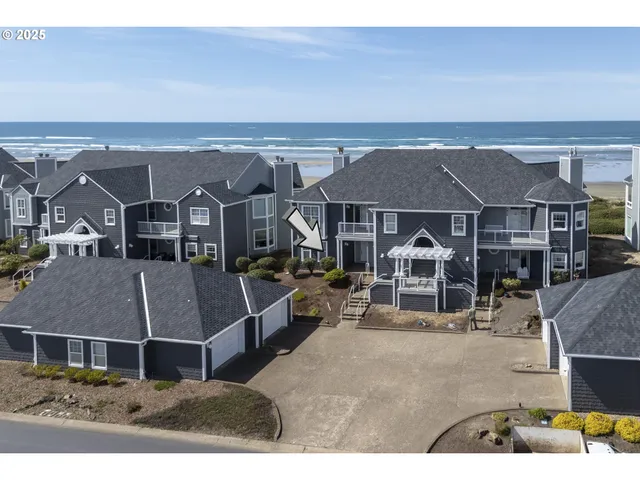 a aerial view of a house with a swimming pool