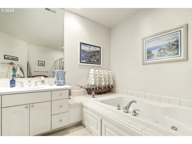 a bed room with a bed and a mirror