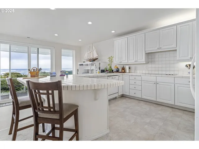 a kitchen with sink and window