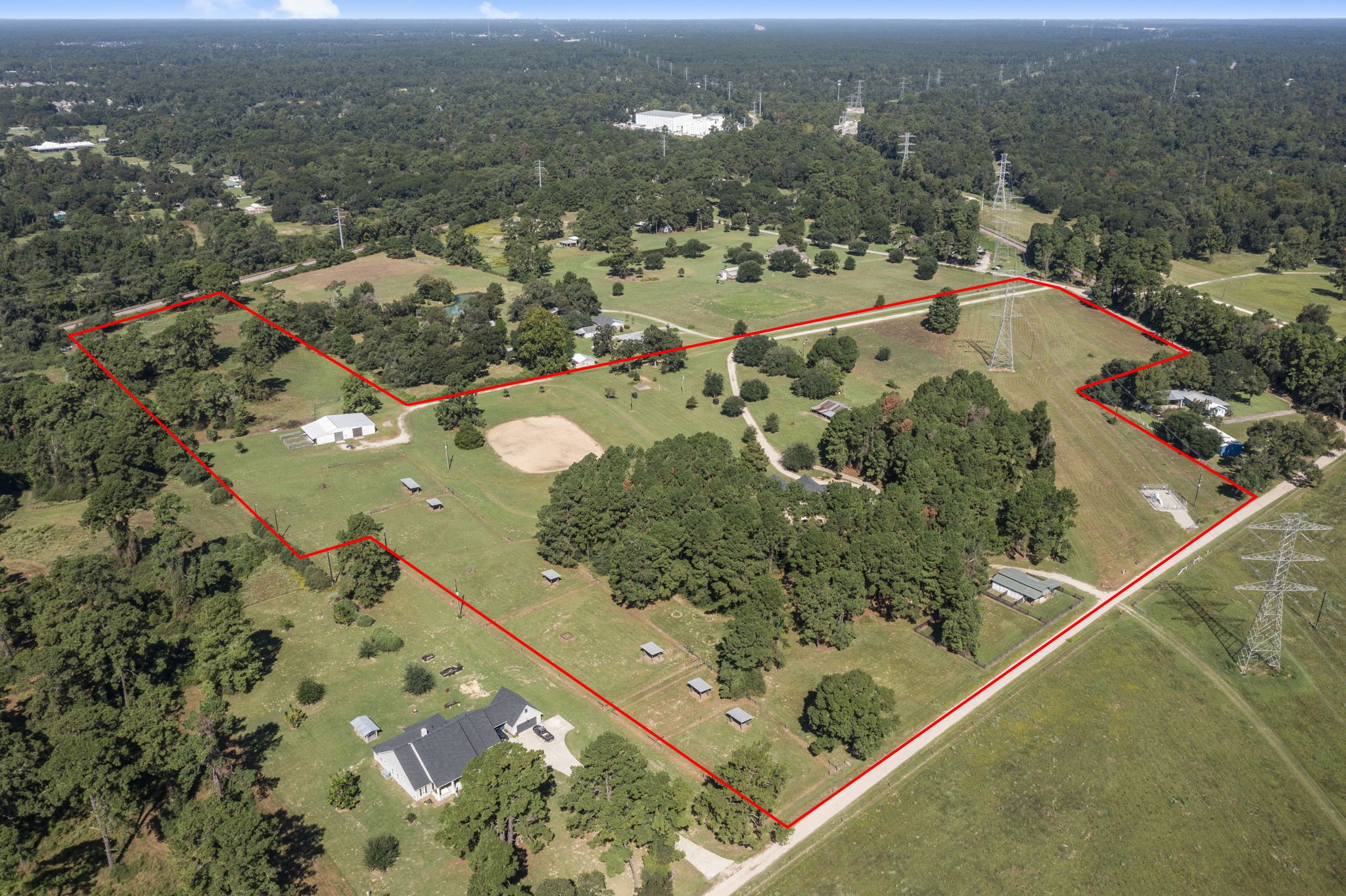 1534 Virgie Community Road Magnolia, TX 77354 - Photo 2 of 50 The entire 29+ acres shown with approximate boundary lines. As you can see, there is an entrance off of Virgie Community as well as a private drive running along the backside of the home and barn.