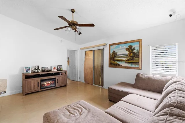 a living room with furniture and a couch