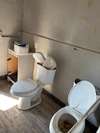 a room with gym equipment and a window