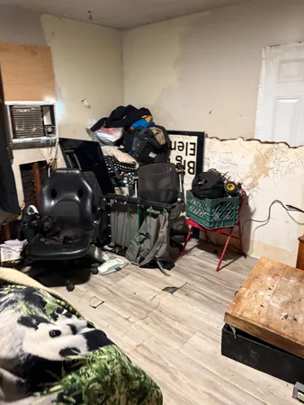 a kitchen with granite countertop a sink and a stove