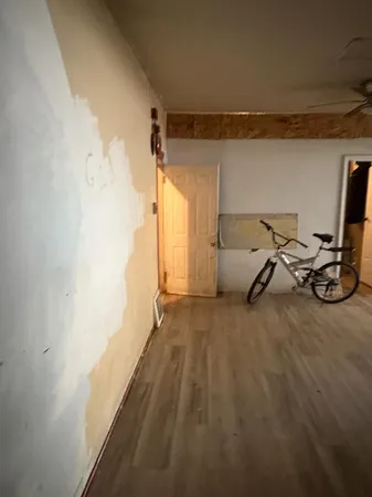 a bedroom with a bed and a table