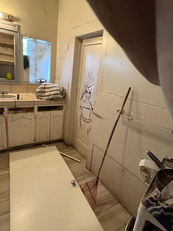 a room with furniture and flat screen tv