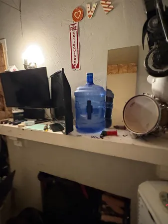 a kitchen with sink cabinets and window