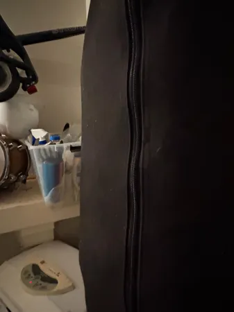 a kitchen with stainless steel appliances granite countertop a sink and a white cabinets