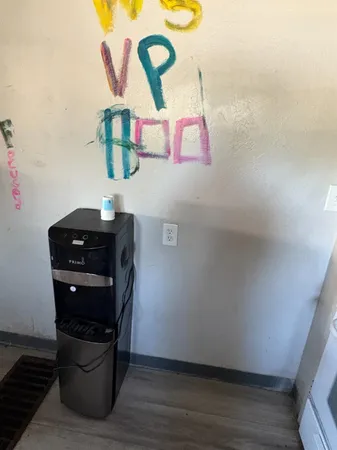 a view of a backyard of the house