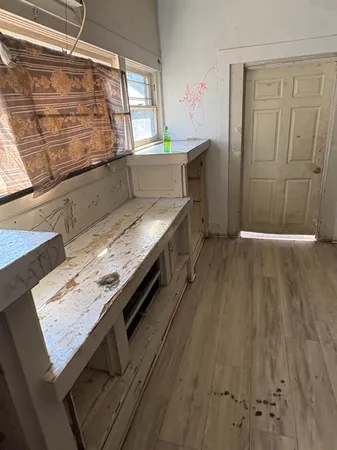 a backyard of a house with seating space