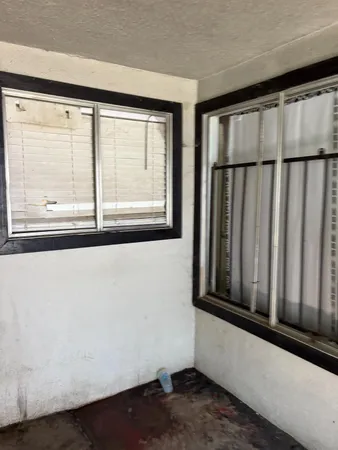 a room with furniture and a flat screen tv