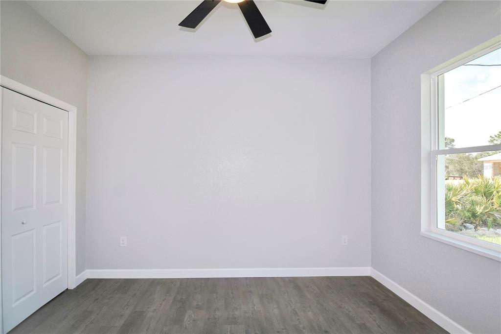 7335 Domenico Street Sebring, FL 33872 - Photo 26 of 38 an empty room with a window