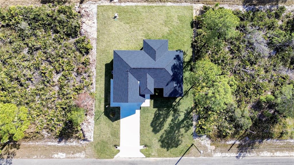7335 Domenico Street Sebring, FL 33872 - Photo 38 of 38 an aerial view of a house