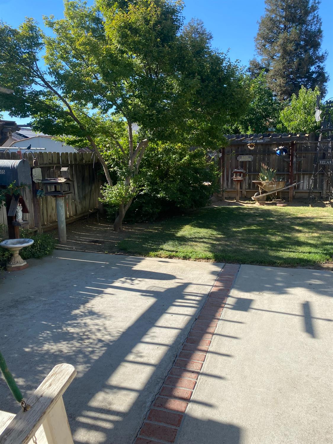 609 Merlot Avenue Madera, CA 93637 - Photo 34 of 45 a front view of a house with a yard