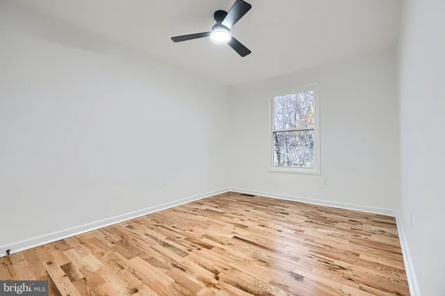 a view of a big room with wooden floor