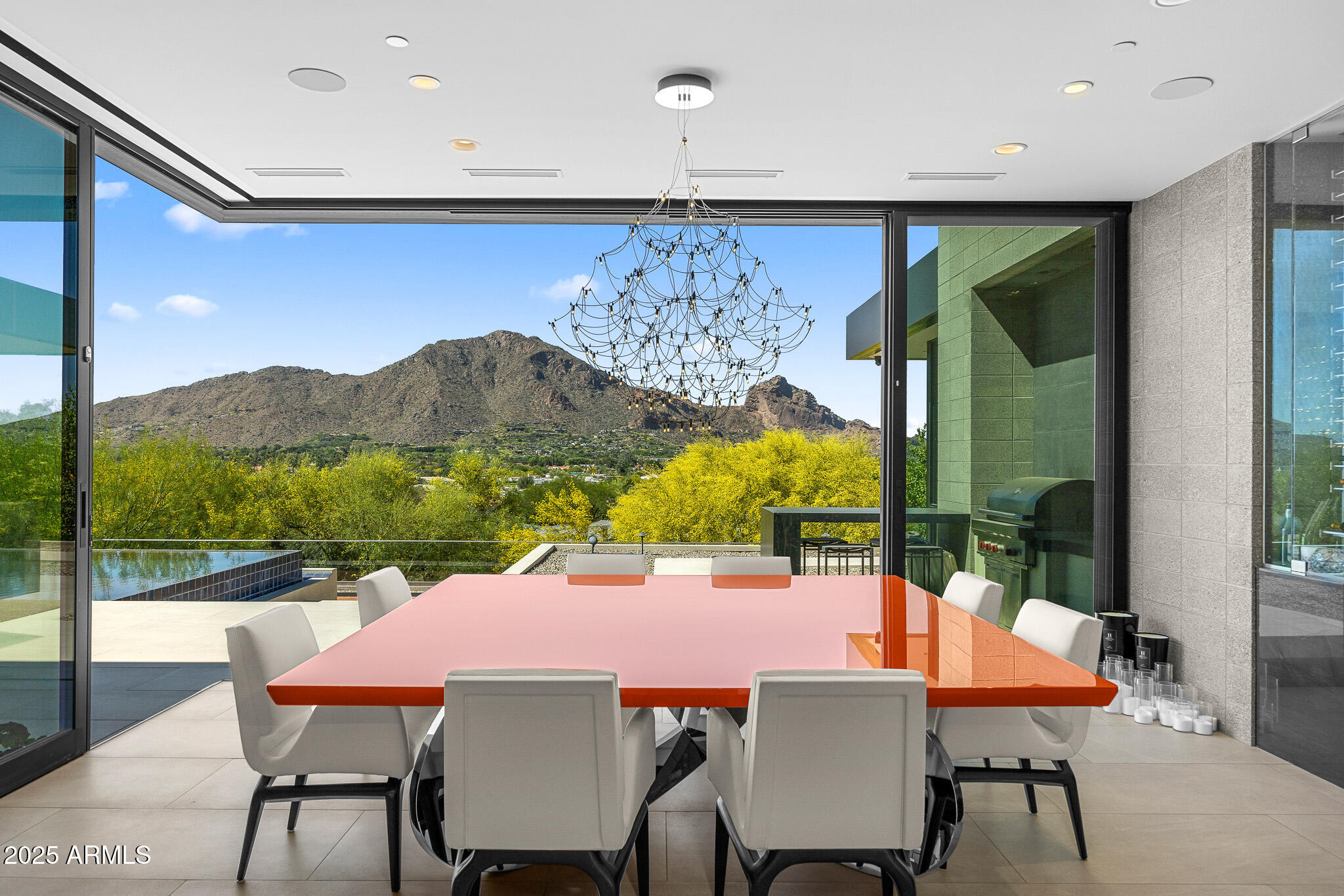 6149 East Indian Bend Road Paradise Valley, AZ 85253 - Photo 3 of 77 a view of a dining room with furniture window and outside view