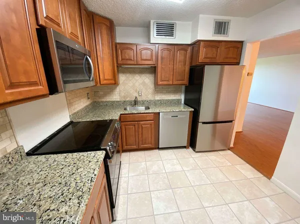 $209,900 | 1800 Old Meadow Road, Unit 1412, McLean, VA 22102