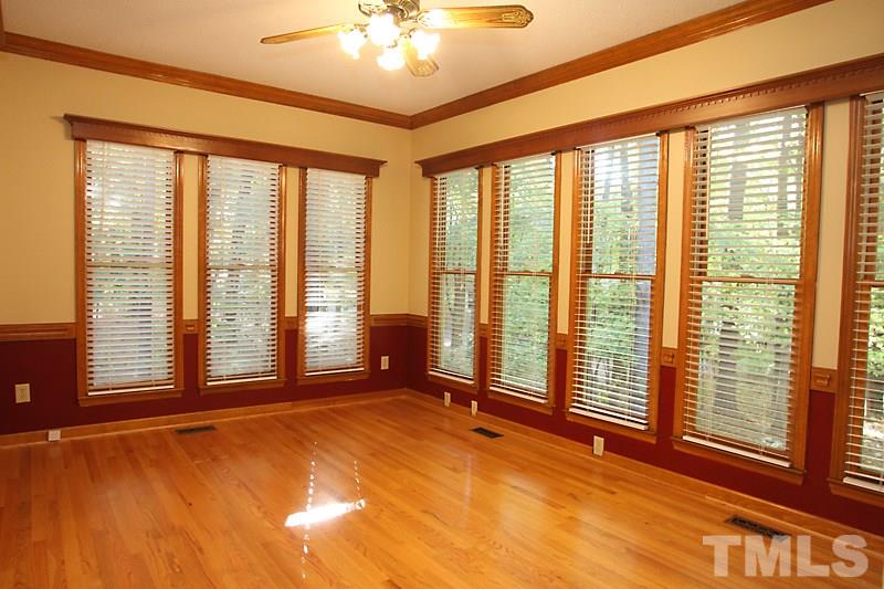 7811 Coach House Lane Raleigh, NC 27615 - Photo 9 of 19 a view of an empty room with a window