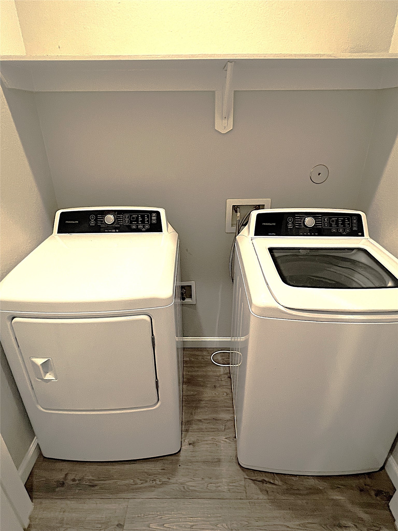 5779 Belarbor Street, Unit A Houston, TX 77033 - Photo 15 of 27 a utility room with dryer and washer