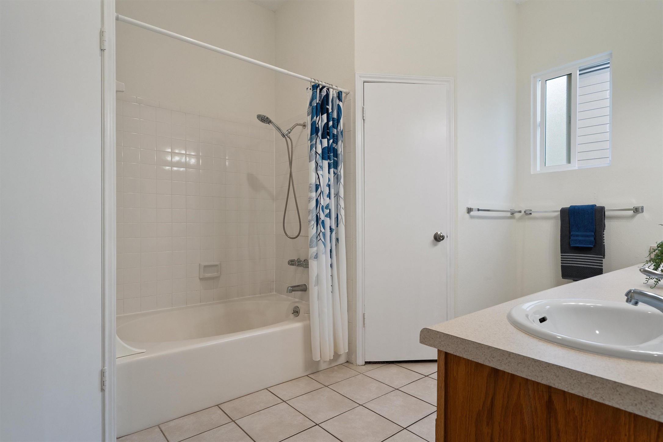 14818 Yellowleaf Trail Austin, TX 78728 - Photo 14 of 40 a bathroom with a tub sink vanity and mirror