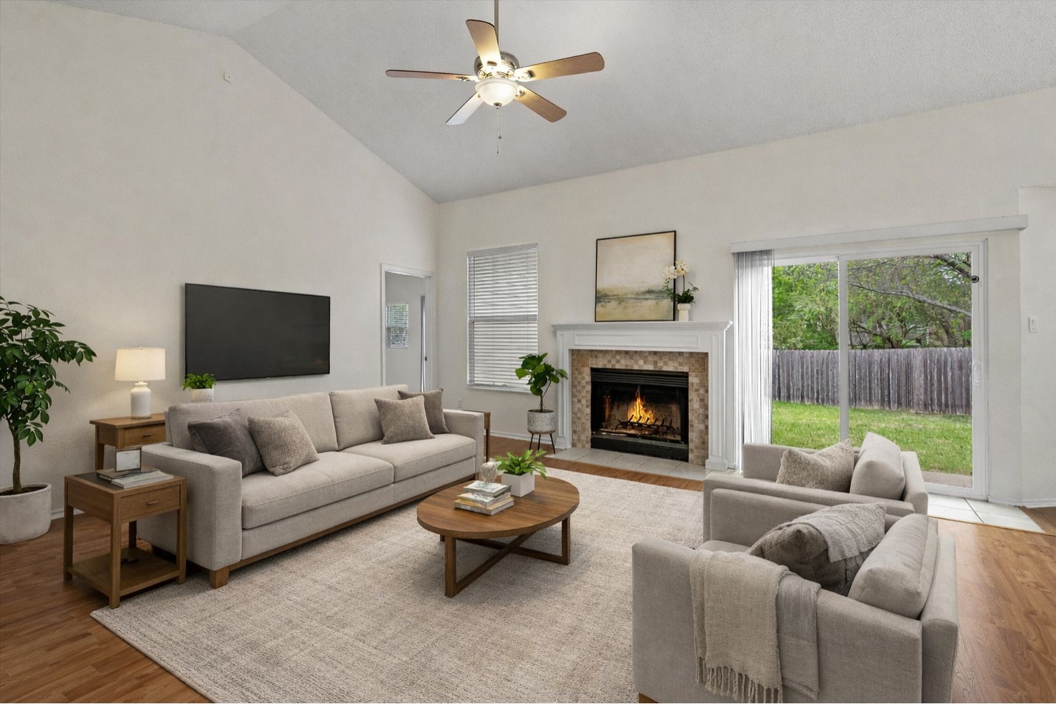 14818 Yellowleaf Trail Austin, TX 78728 - Photo 2 of 40 a living room with furniture and a fireplace