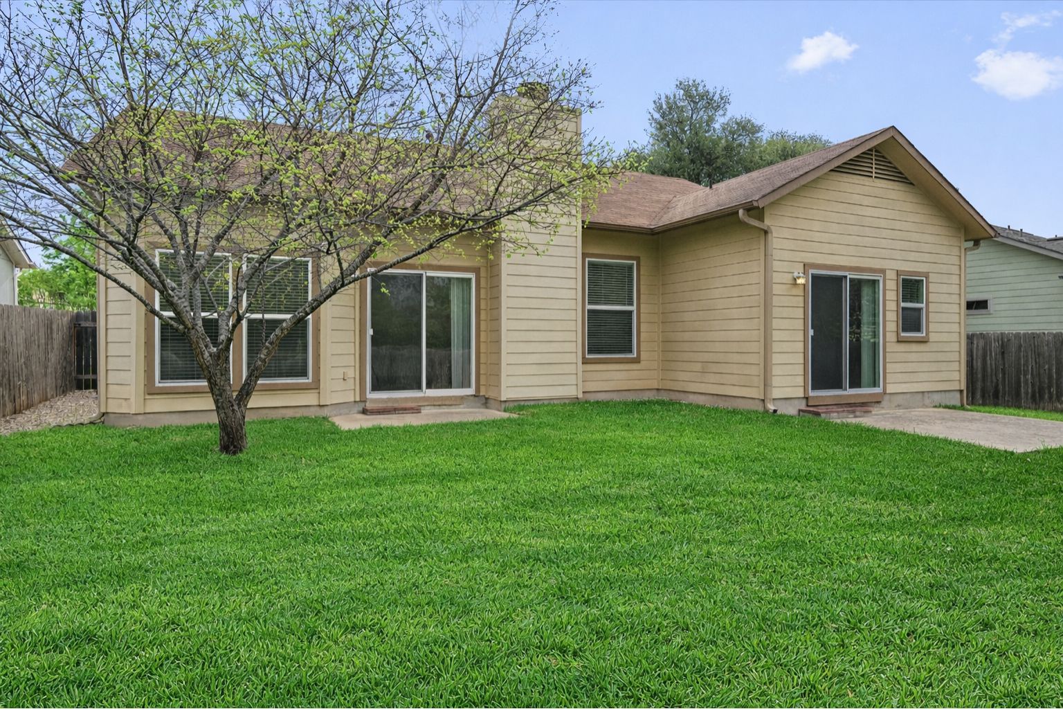 14818 Yellowleaf Trail Austin, TX 78728 - Photo 21 of 40 a view of a house with a yard