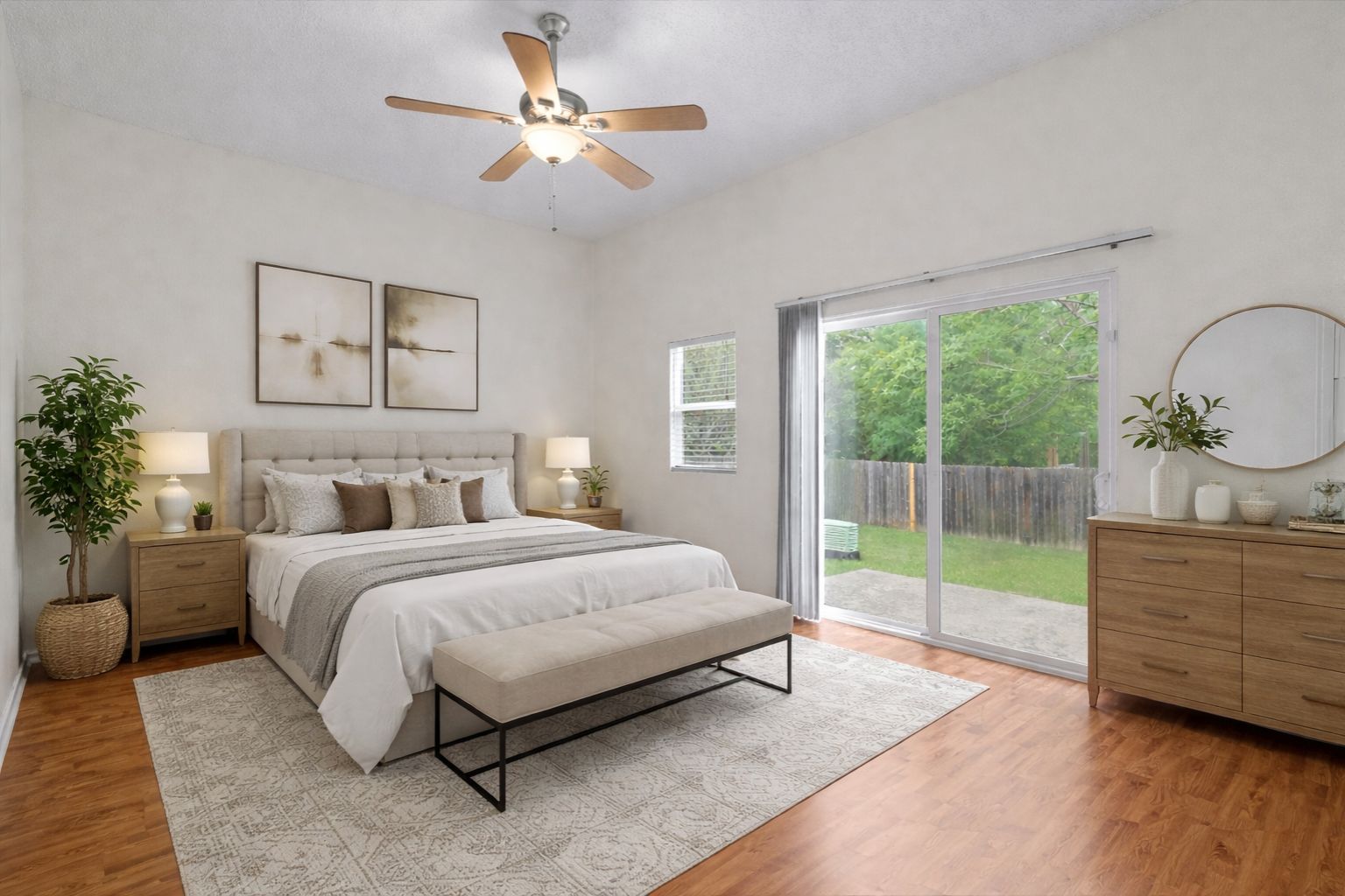 14818 Yellowleaf Trail Austin, TX 78728 - Photo 5 of 40 a bedroom with a bed dresser and wooden floor