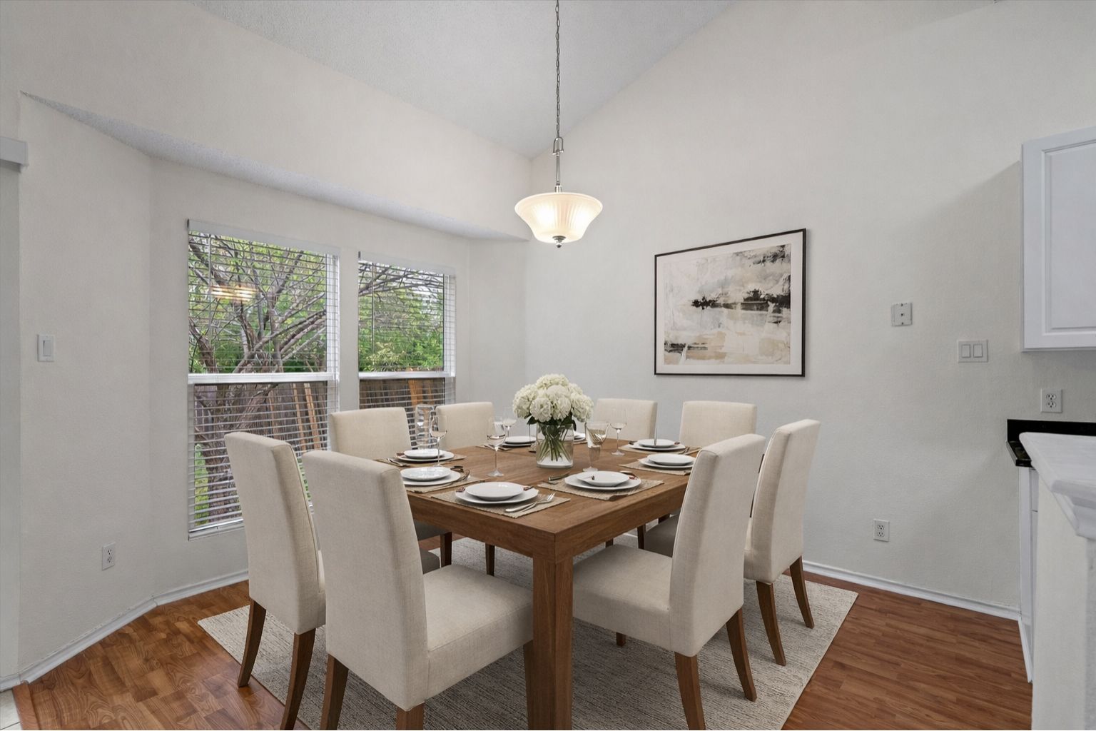 14818 Yellowleaf Trail Austin, TX 78728 - Photo 6 of 40 a view of a dining room with furniture window and wooden floor