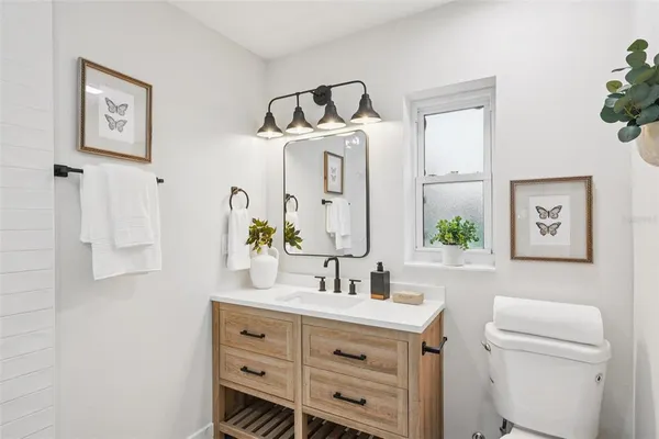 a bathroom with a sink and a shower