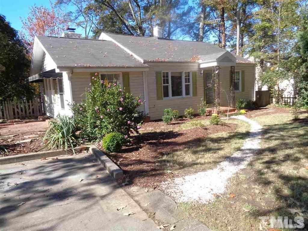 2901 Oberlin Road Raleigh, NC 27608 - Photo 1 of 18 a front view of a house with garden