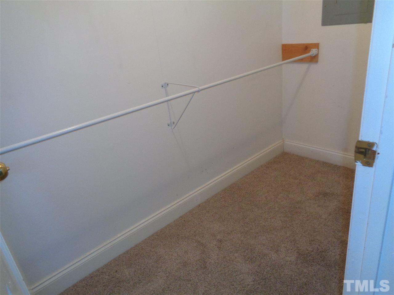 2901 Oberlin Road Raleigh, NC 27608 - Photo 12 of 18 a view of a room with racks on the wall