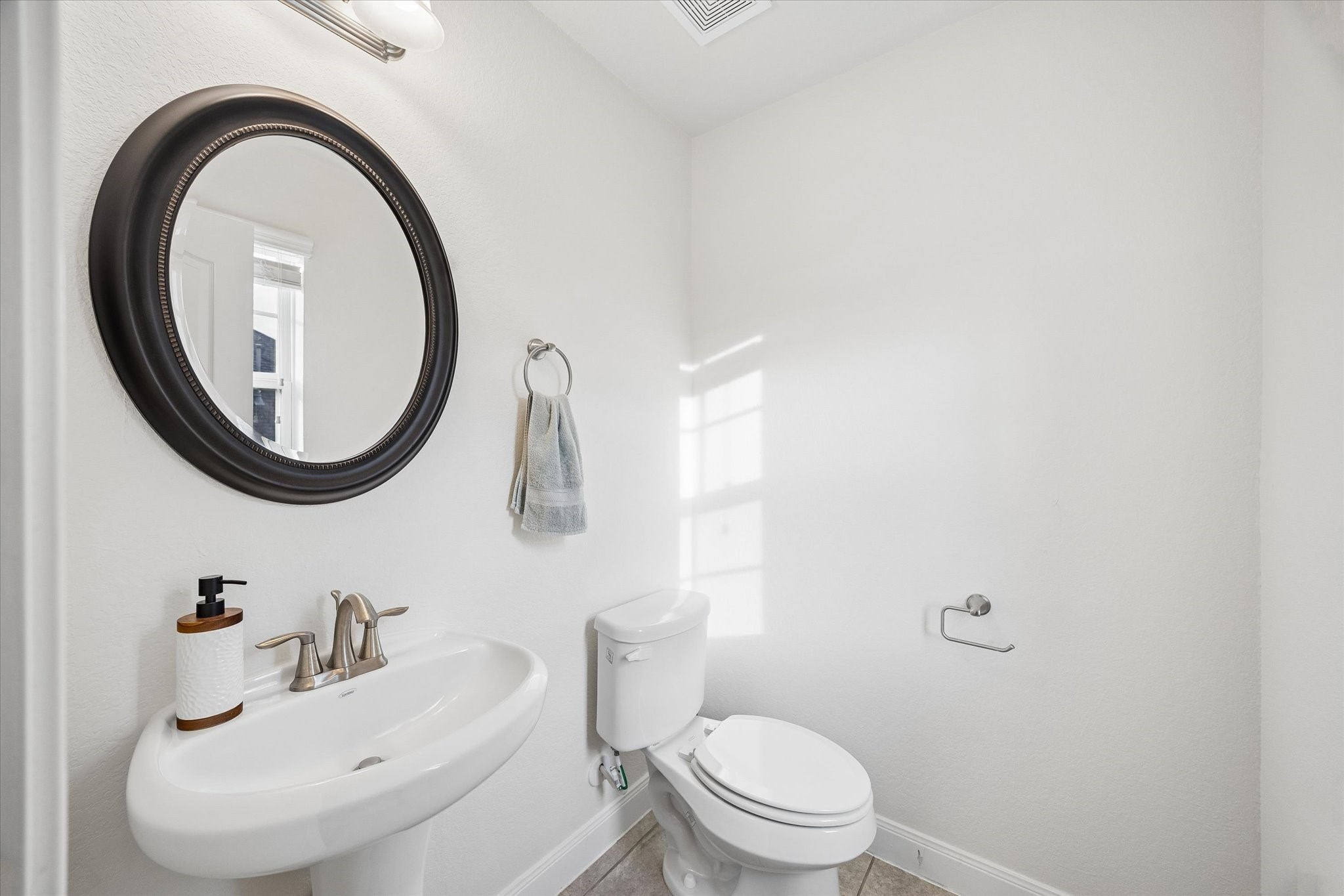 3306 Explorer Way Conroe, TX 77301 - Photo 24 of 35 Upstairs half bath.