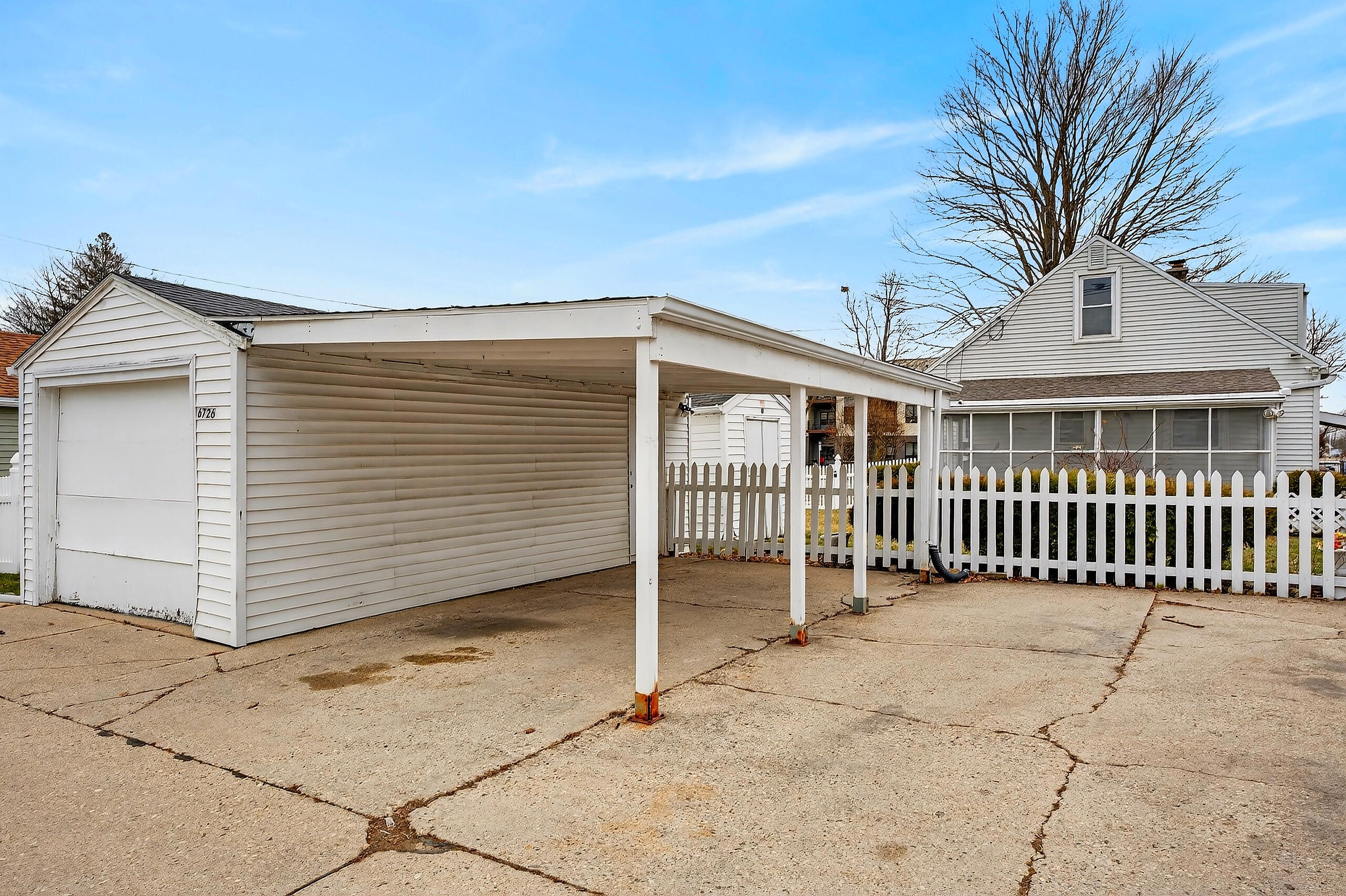6726 West Silver Spring Drive Milwaukee, WI 53218 - Photo 45 of 46 garage with car port