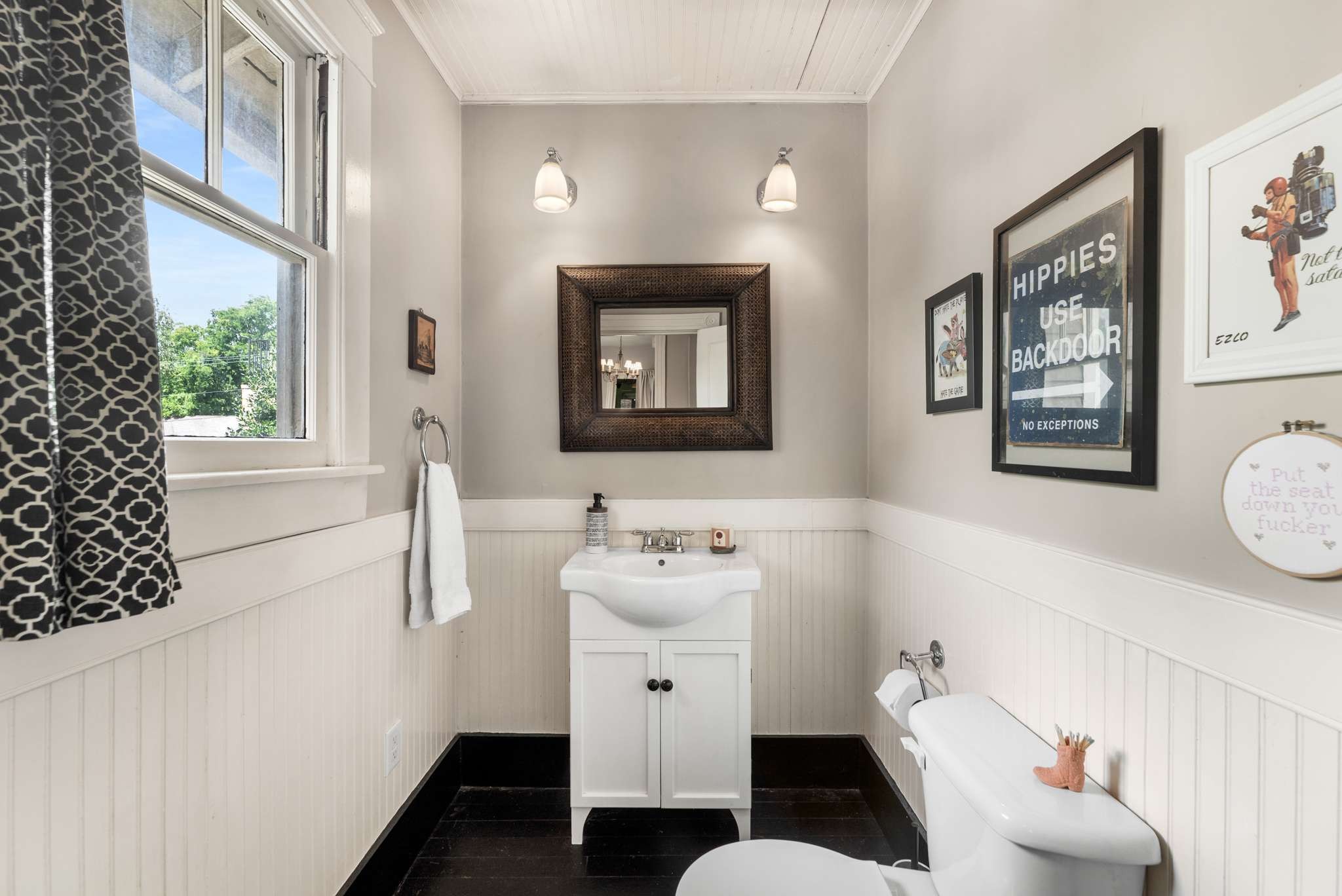 3905 Nevada Avenue Nashville, TN 37209 - Photo 16 of 39 a bathroom with a sink mirror and toilet