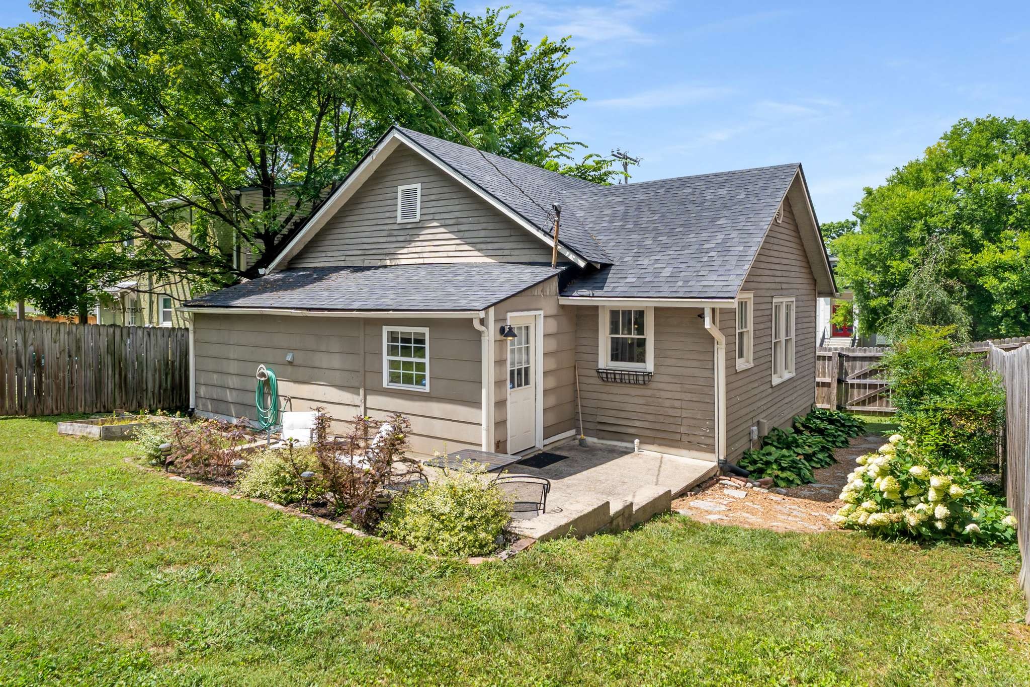 3905 Nevada Avenue Nashville, TN 37209 - Photo 26 of 39 a view of a house with a yard and plants