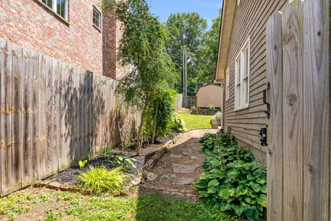 a view of a back yard of the house