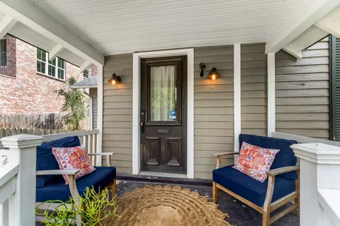 a building outdoor space with patio furniture