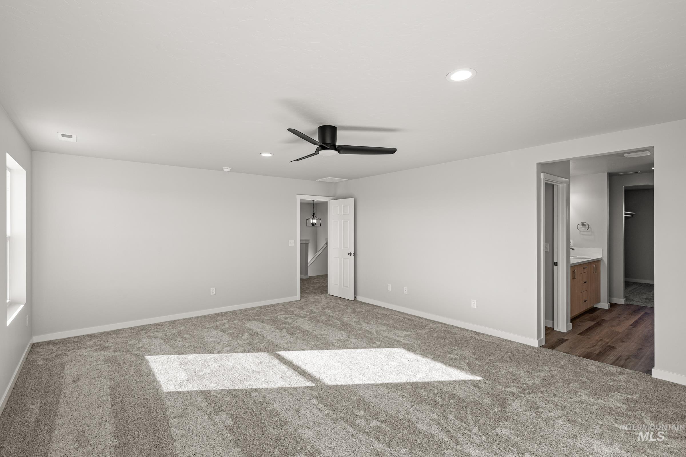 1647 Dyer Street Middleton, ID 83644 - Photo 20 of 25 Unfurnished bedroom featuring recessed lighting, ensuite bath, a ceiling fan, and carpet floors