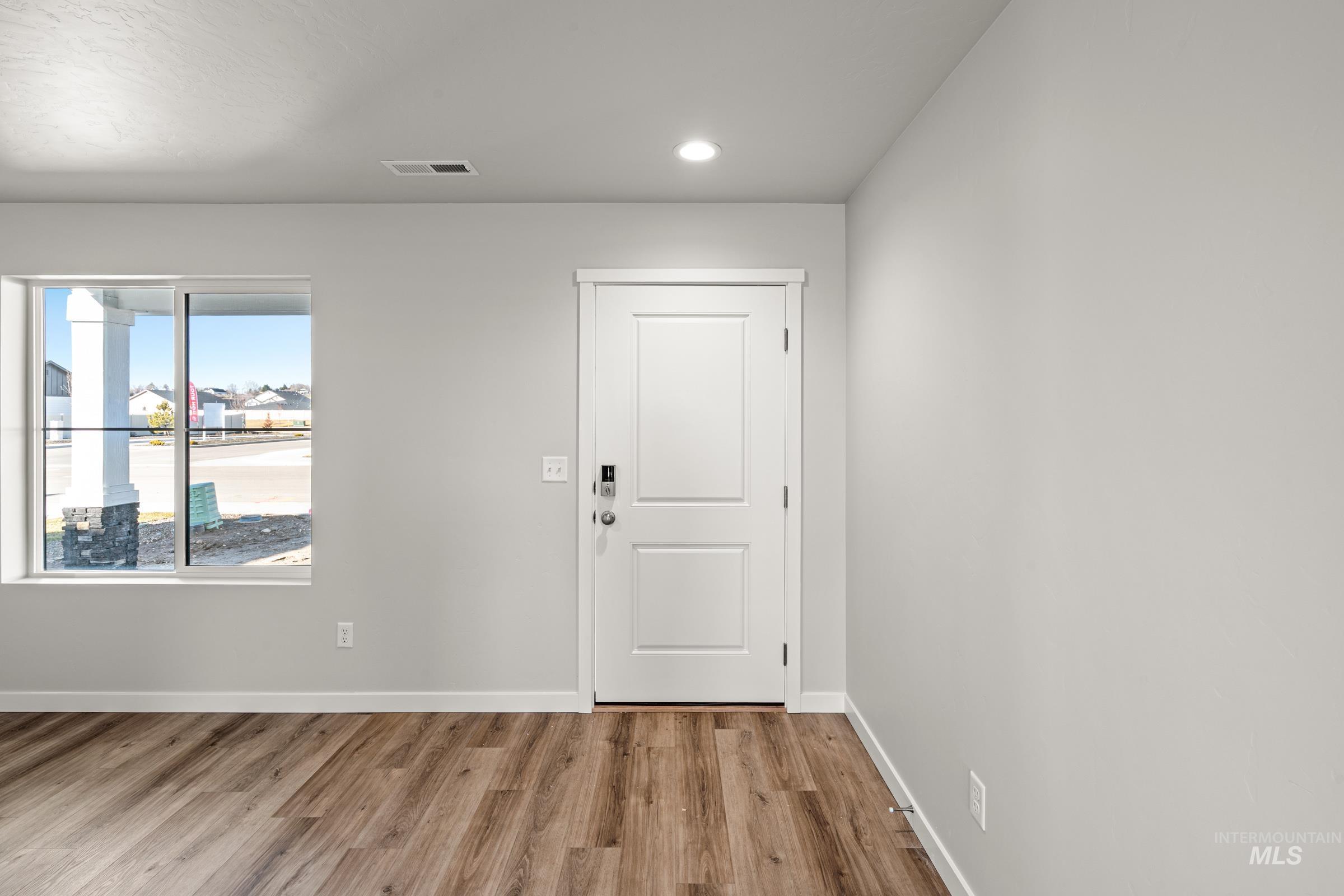 1647 Dyer Street Middleton, ID 83644 - Photo 2 of 25 Entryway with wood finished floors and recessed lighting