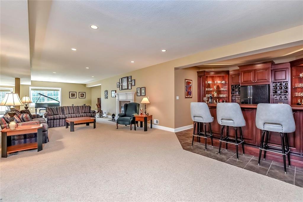 182 Joe Cain Road Bulger, PA 15019 - Photo 21 of 25 Entertainment abounds in this incredible Game Room with Fireplace, A Full bath and Loads of Light!