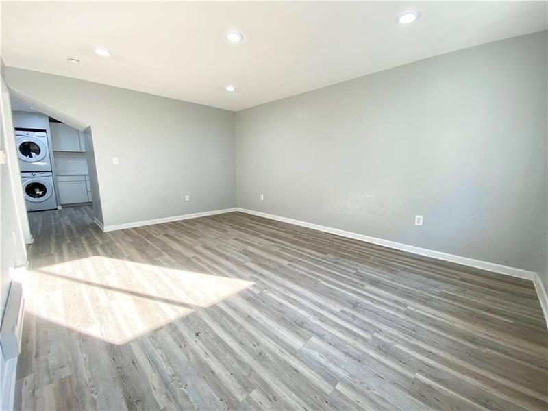 6630 Library Road South Park, PA 15129 - Photo 6 of 21 an empty room with wooden floor