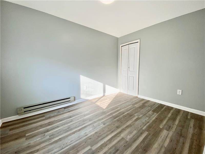 6630 Library Road South Park, PA 15129 - Photo 7 of 21 a view of empty room with wooden floor
